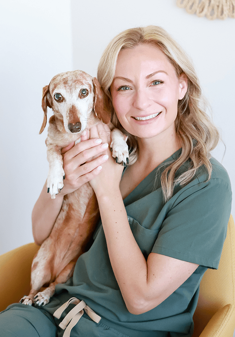 Emily with small tan dog